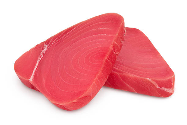 istock Fresh tuna fish fillet steak isolated on white background with clipping path and full depth of field 1356008952