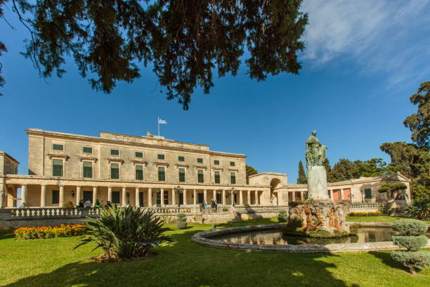 Palace of St. Michael and St. George at Corfu Town, Kerkyra on Corfu Island, Greece Corfu, Greece, 30th of September: Tourist visiting
the Palace of St. Michael and St. George at Corfu Town in the garden statue of
Sir Frederick Adam, Kerkyra on Corfu Island, Greece corfu holiday palace stock pictures, royalty-free photos & images