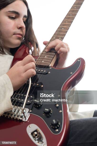 Young Man Moves The Tremolo And Shakes His Guitar While Playing A Rock Solo Stock Photo - Download Image Now