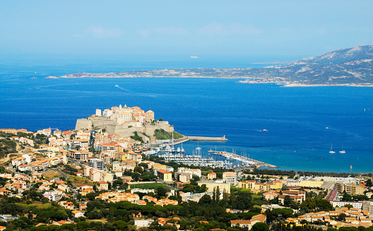 Aerial view Bay of Calvi and harbor, Corsica, France.