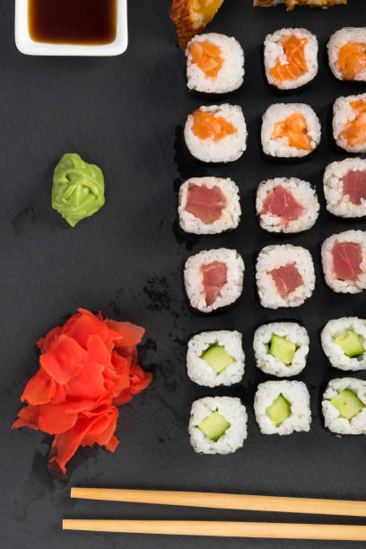 istock set of rolls and sauces on a black plate, top view 1356023228