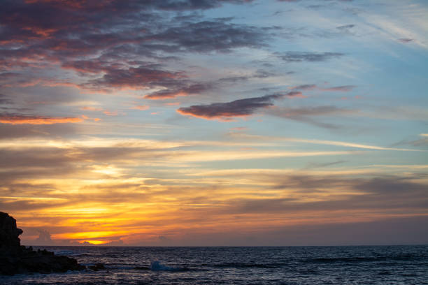 istock Colorful sky over the sea at sunset 1356023499