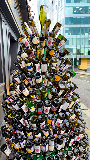christmas tree made of different wine bottles, vertica photo