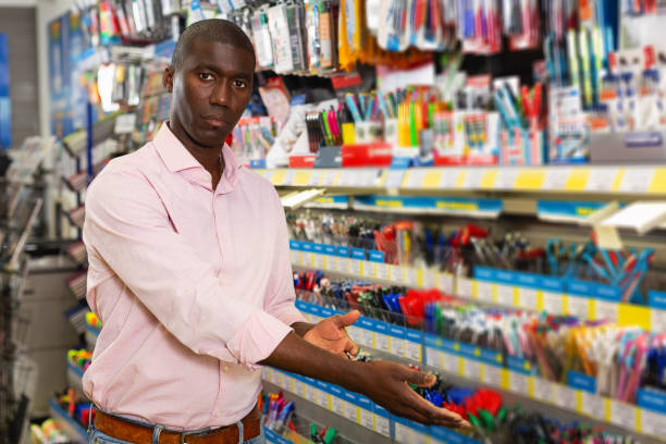 istock male customer choosing new pen 1356028888