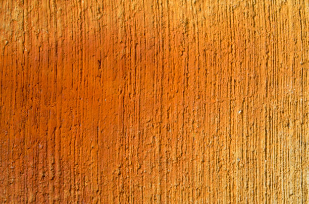Relief cement screed colored orange close up