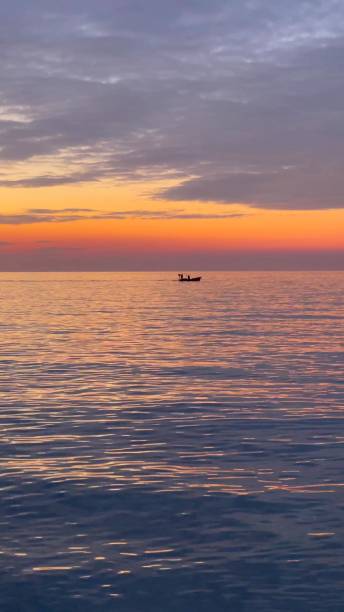 istock A background photo with a boat on the sea 1356030635