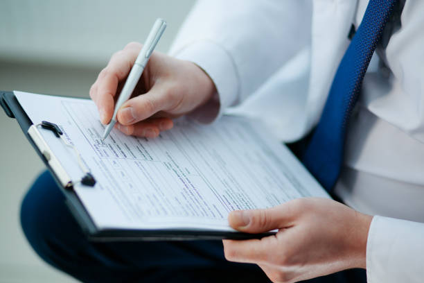 istock close-up. doctor making notes on the clipboard 1356040361