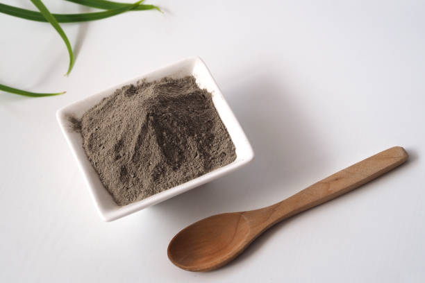 istock Dry clay powder in a white bowl 1356040526