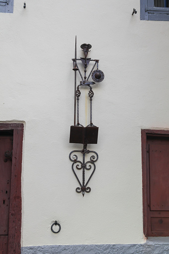 2018 June 15. Spain. Grandas de Salime. A fragment of the house is decorated with an iron statue of Don Quixote, a character recognized as the best book in the world.