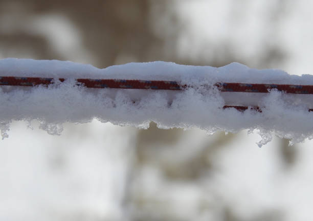 istock Clotheslines covered in ice and snow 1356040955