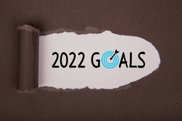 istock Torn Paper With New Year 2022 Goals On White Background 1356043106
