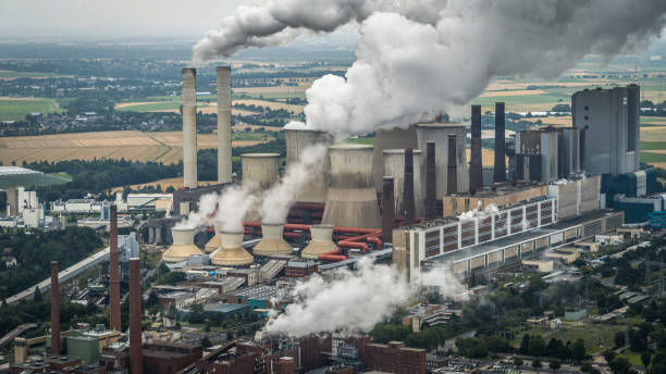 aerial view of a coal burning power plant - lignito imagens e fotografias de stock