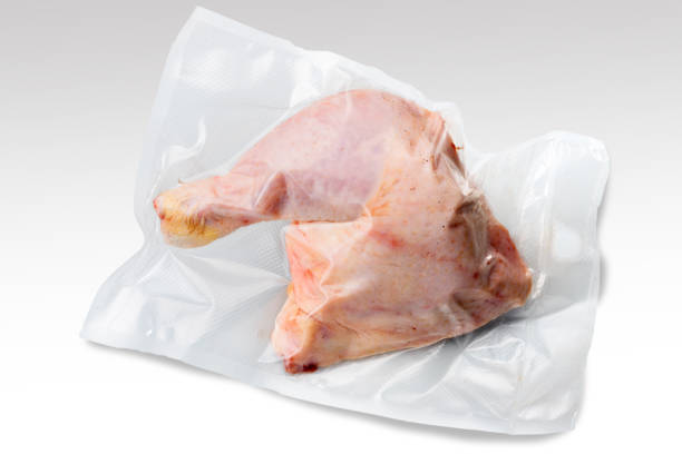 istock Whole chicken thighs in vacuum packed 1356044220