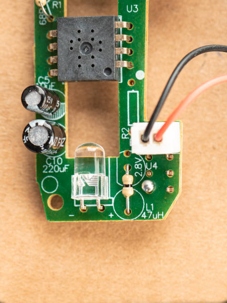istock Small green board with resistors, capacitors, LED and chip. 1356044476