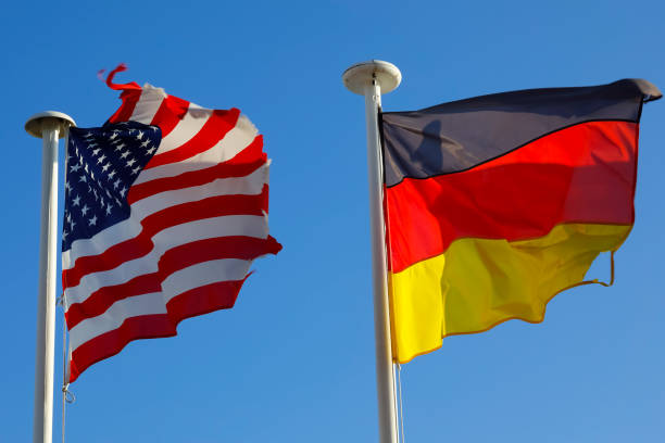istock Two National Flags of both USA and Germany 1356044560