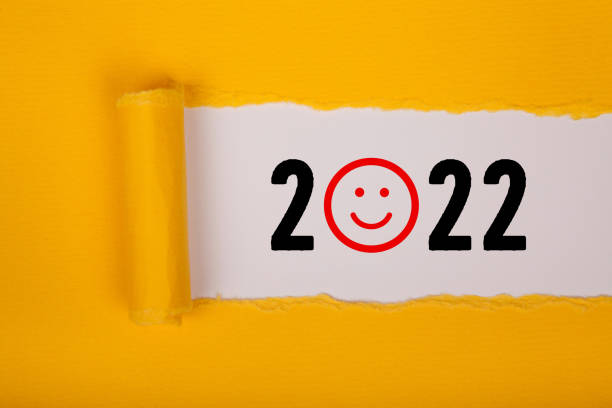 istock Torn Paper With Happy New Year 2022 On White Background 1356046038