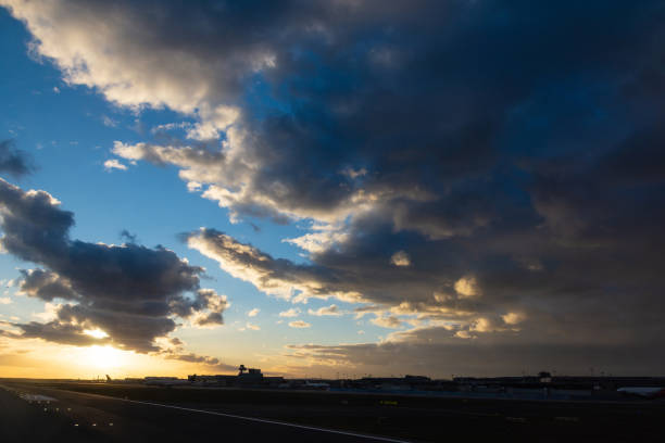 istock Impressive cloudscape above airport 1356046223