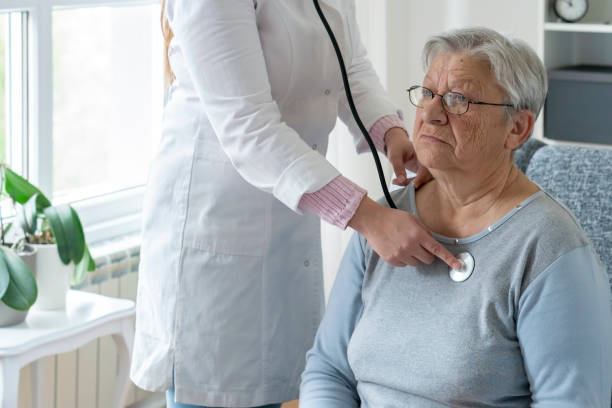 istock Caregiver at home 1356046615