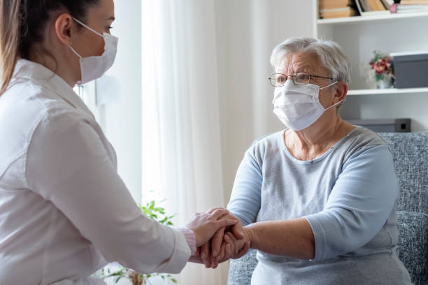 istock Caregiver at home 1356046637
