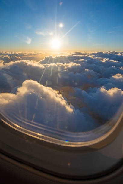 istock sun  flares in an airplane window 1356046719