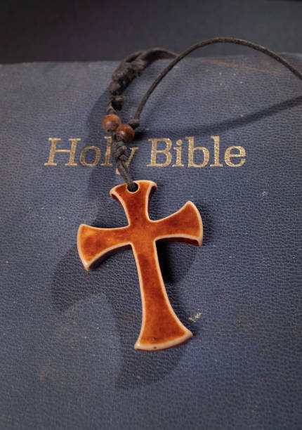 istock Holy Religion bible and Cross 1356048261