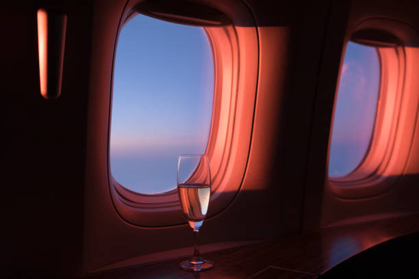 glass of champagne in first class - nobody alcohol champagne wine imagens e fotografias de stock