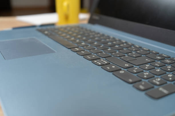 istock Soft focus of a Spanish version laptop keyboard. Technology concept, homeoffice 1356054891