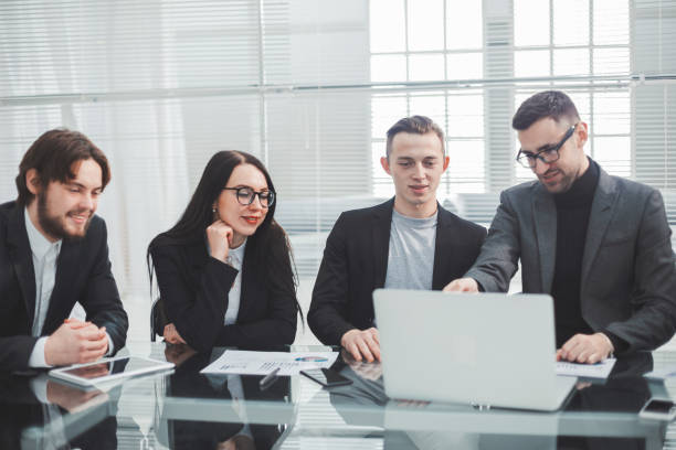 istock close up. business team discussing financial documents 1356055103