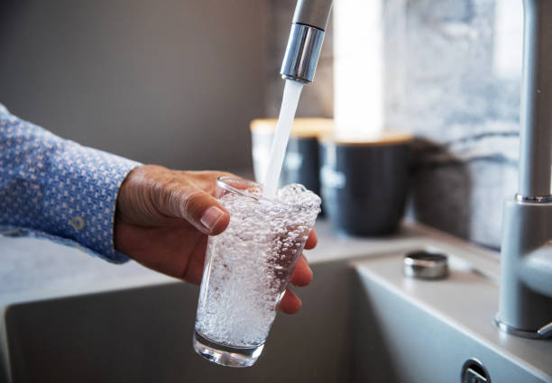 istock Pouring a Fresh Glass of Water 1356056181