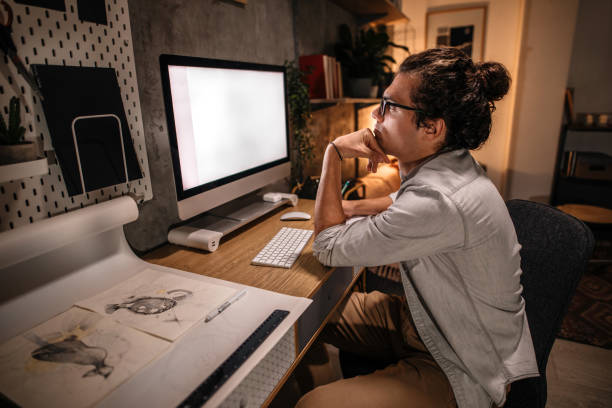 istock Trying to finish job before morning 1356060964