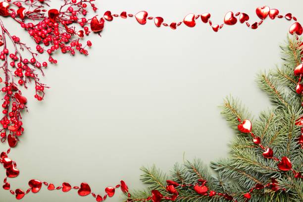 istock Christmas pine branches with red decor on olive background, xmas concept 1356062479