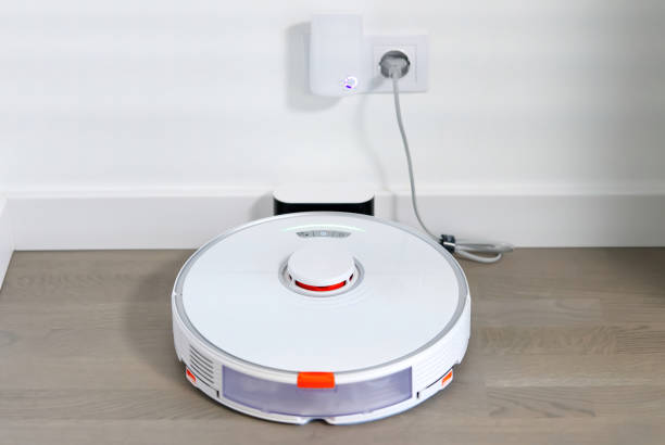 istock robot vacuum cleaner on charging dock station 1356064517