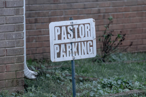 pastor parking sign at an old church