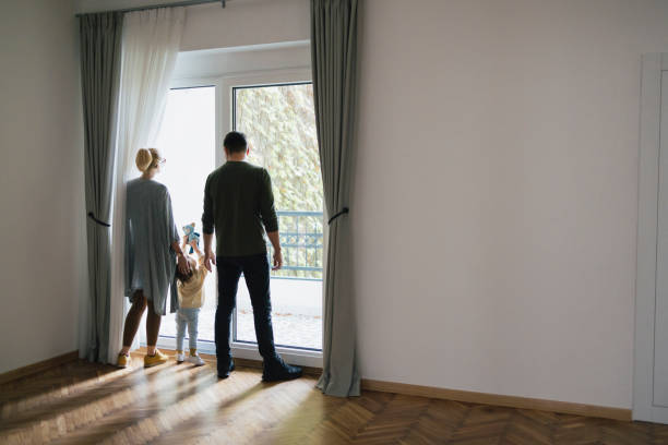 istock Anonymous Family Moving In New Home 1356074052