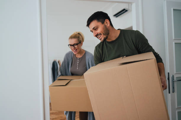 istock Loving Couple Moving In New Home 1356074082