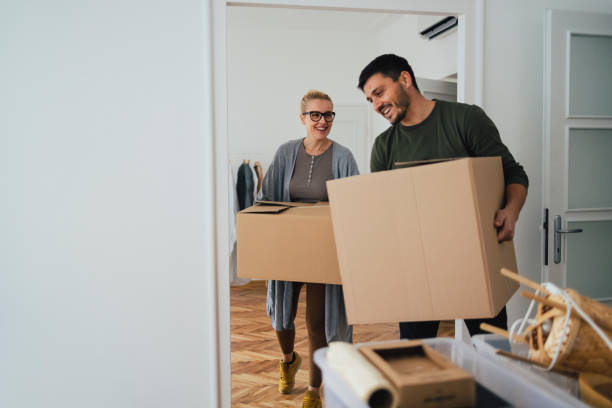 istock Loving Couple Moving In New Home 1356074086