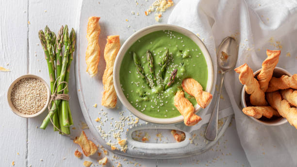 istock Vegan creamy asparagus soup as perfect starter in restaurant. 1356076582