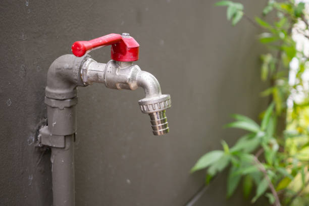 Close up of Dripping tap wasting water