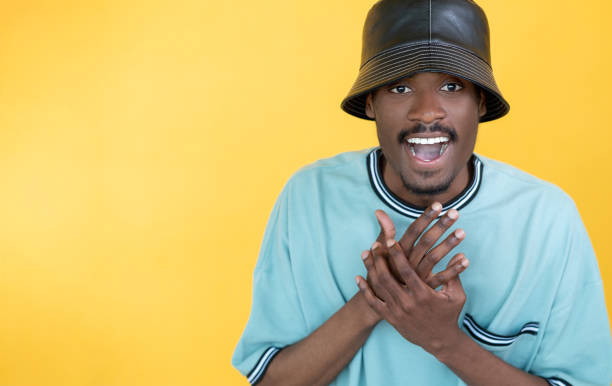 istock wow reaction happy man rapper lifestyle positive 1356078570
