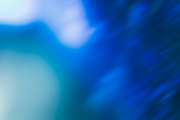 istock defocused glow overlay light flare blue rays spot 1356078623