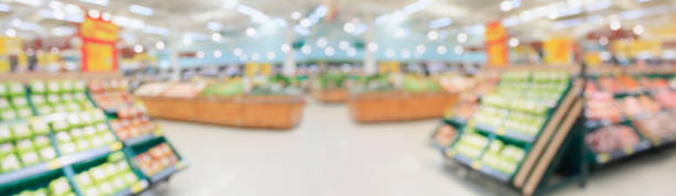 istock supermarket grocery store interior aisle abstract blurred background 1356078640