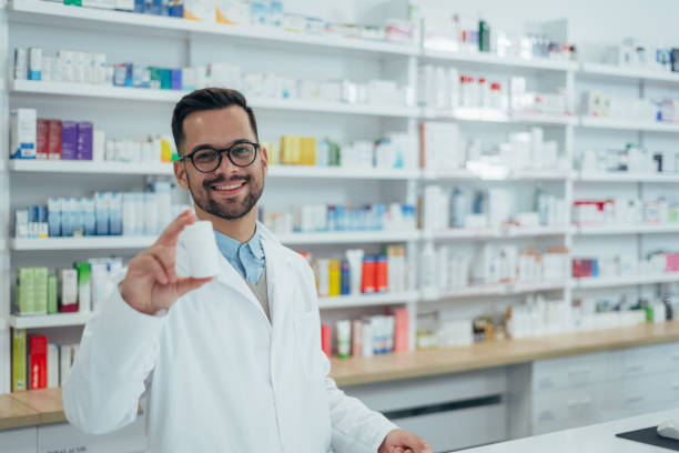 istock Portrait of a handsome pharmacist working in a pharmacy 1356079179