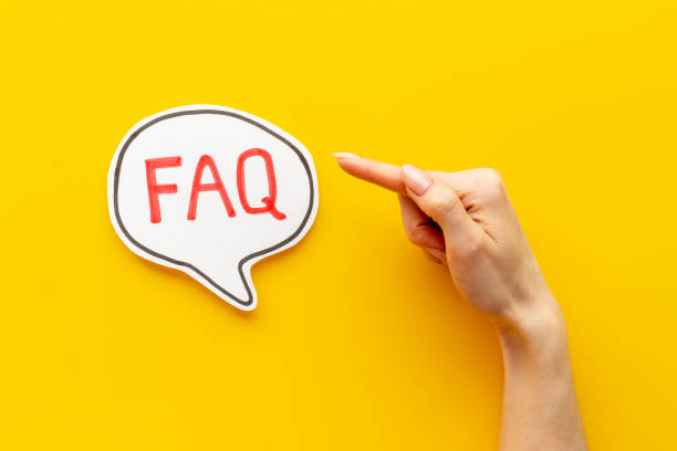 istock Hands with faq - frequently asked questions - text on paper bubble 1356081364