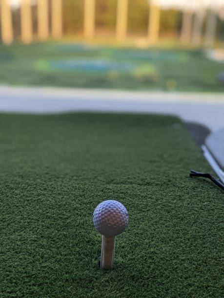 istock golf ball on tee at golf club 1356084149