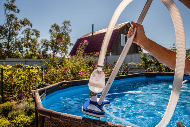 istock Swimming pool vacuum cleaner. Cleaning equipment for small pools 1356084228
