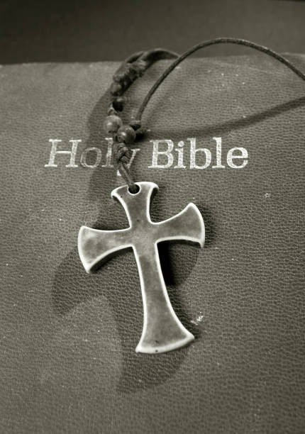 istock Holy Religion bible and Cross 1356086536