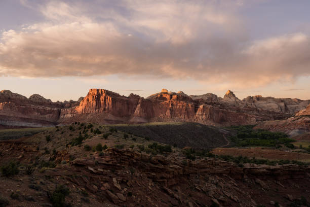 istock Scenic Drive Road Winds Below Rock Formations 1356088011