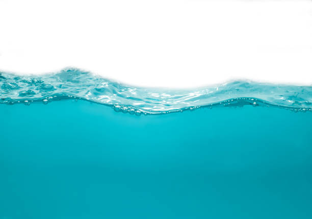 istock Water waves splash with air bubbles, isolated on the white background. abstract blue water waves on a white background. for a product, advertising,text space 1356099782