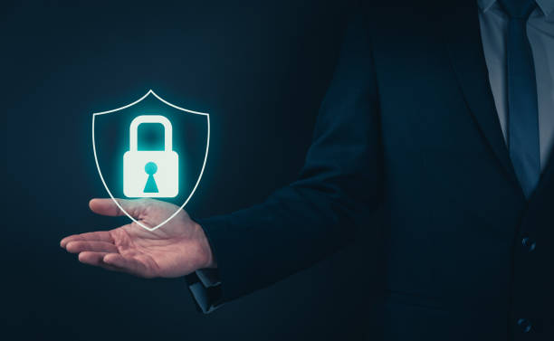 istock Businessman wearing black suit and hand holding interface online and icon key lock network connection on screen. Cyber Security of network. Innovation technology concept. 1356109248