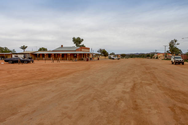 Corfield, Queensland: View showing the historic Corfield Pub in a dry landscape with bitumen road at Corfield, Queensland, Australia